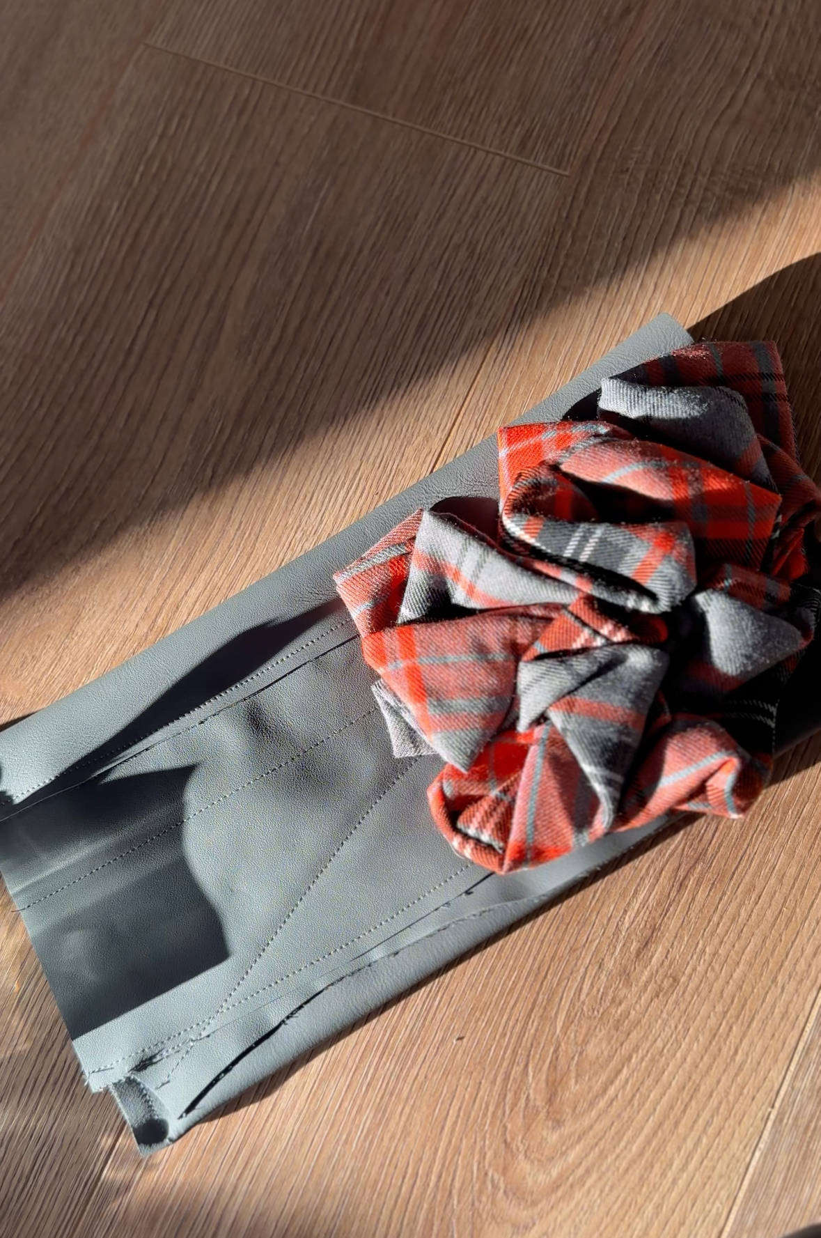 Isabelle Orange & Grey Tartan Ruffled, Leather Clutch Bag.